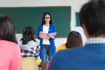 College teacher and students in the classroom