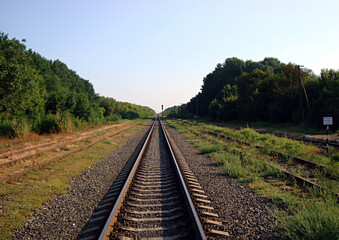 Fototapeta na wymiar Railway in greenery.