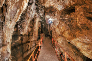 Passage in tourist limestone caves in the Brembana valley Bergamo Italy