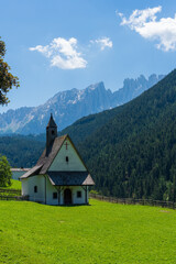 Fototapeta na wymiar Welschnofen chapel St. Sebastian in Dolomites