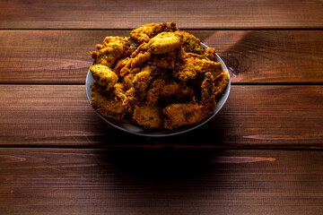 plate with a lot of chicken wings