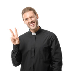 Handsome priest on white background