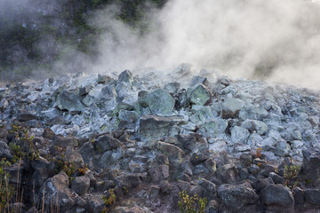 Volcanic gases rich in carbon dioxide, sulfur dioxide and hydrogen sulfide seep out of the ground...