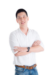 Asian handsome man in white shirt standing and smiles over white background.