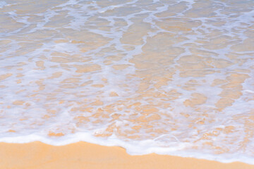 Close up beautiful sea wave on tropical sand beach in summer background