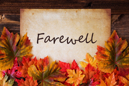Grungy Old Paper With English Text Farewell. Colorful Autum Decoration With Leaves