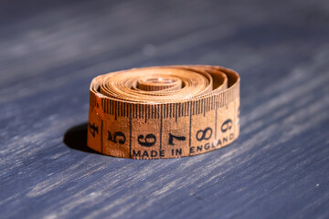 old English pocket tape to take measurements to sew the clothes