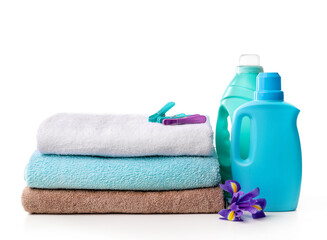 Detergent with washing powder and towels isolated on white