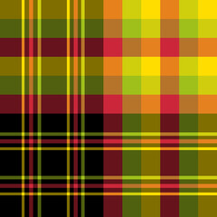 Seamless pattern in simple bright red, green, yellow and black colors for plaid, fabric, textile, clothes, tablecloth and other things. Vector image.
