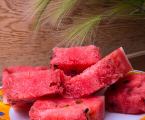 Watermelon slices on a plate close up