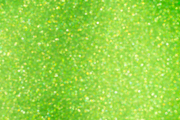 Glamor green sparkling background. Blured glitter background. Holiday abstract texture. Background of blue lights.