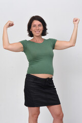 pregnant womanwith biceps on white background