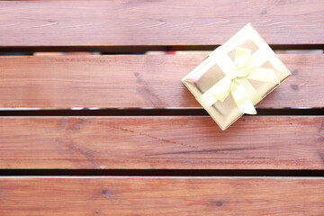 decoration box for the gift on the wood 