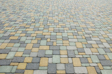 Multicolored paving slabs. Detailed image. Many colored tiles.