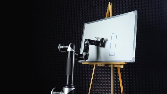 Programmed robor draws financial infographics, a futuristic robot hand draws a marker on a blackboard, modern technology.