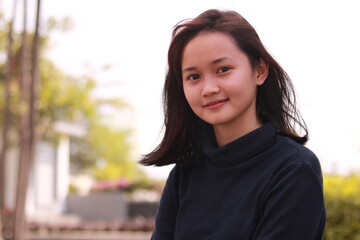 a portrait of a beautiful young woman