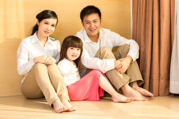 Fototapeta na wymiar Happy family smiling together at home