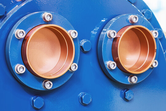 thick copper pipes with flanges for cooling or air conditioning systems