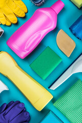 various cleaning and cleaning products on a blue background. The view from the top