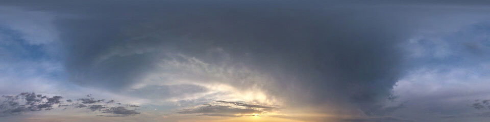 dark blue sky before sunset with beautiful awesome clouds before storm. Seamless hdri panorama 360 degrees angle view with zenith for use in graphics or game development as sky dome or edit drone shot