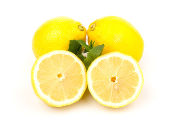 Group of lemons with mint leaves, isolated on white background