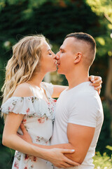 Fototapeta premium beautiful and happy couple having fun in garden.