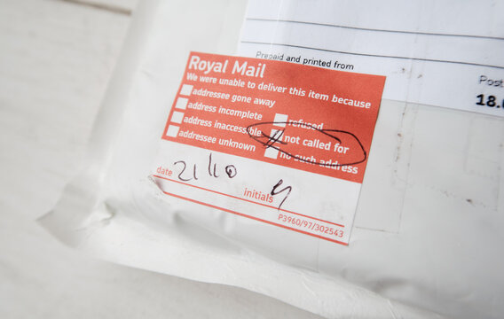 London, Uk, 05/05/20202 A Royal Mail Underpaid Item Fee Return Request On A Second Class Posted Large Letter. Pre Paid Post Returns Lost In The Post. Return To Sender White Envelope.