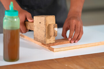 Process of gluing plank of plywood