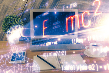 Desktop computer background and formula hologram writing. Double exposure. Education concept.