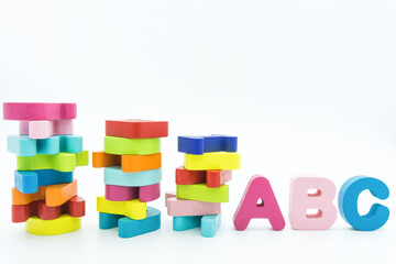 Fototapeta premium Colorful wooden educational abc toy puzzle for kids.