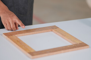 Process of gluing plank of plywood