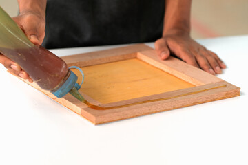 Process of gluing plank of plywood