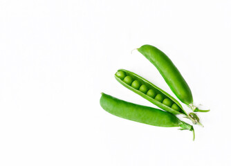 green ripe peas, green beans on a white background