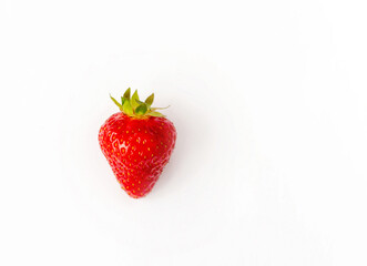 red strawberry, ripe juicy berry on a white background