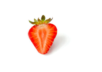 red strawberry, ripe juicy berry on a white background