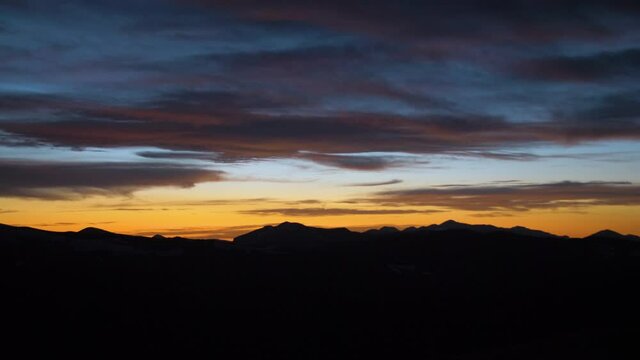 Rocky mountain sunset sunrise looking over mountain range