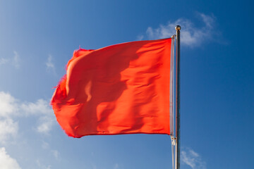 Swimming is prohibited. Red warning flag