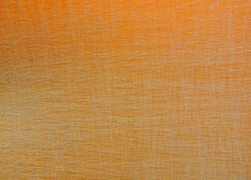  surface of orange plastic scratched surface   
