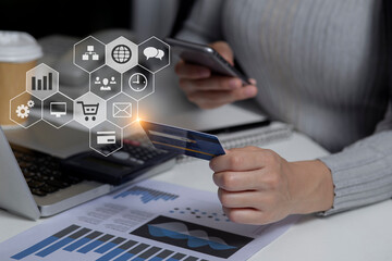 Business hands of using smartphone with Digital marketing media and virtual globe shape diagram. Business Financial icons graphs. Work from home.