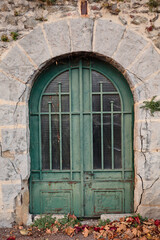 Fototapeta na wymiar antique door in a stone house