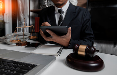 Justice and law concept. Lawyer business man working with tablet at table office. 	