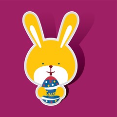 bunny holding an easter egg