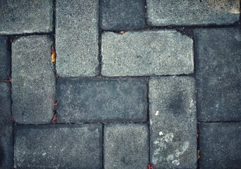 old and rough brick wall.dirty surface of paving brick floor background