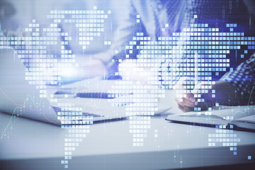 Multi exposure of businessman working on laptop on background. International business hologram in front. Concept of success.