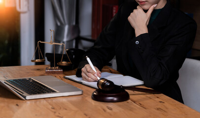 Fototapeta na wymiar Concepts of Law and Legal services. Lawyer working at table office. 