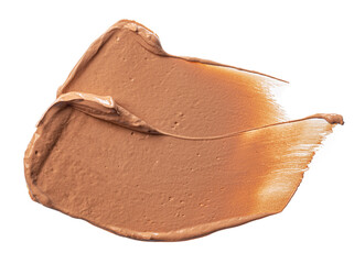 Smudged stain of a cream foundation isolated on white