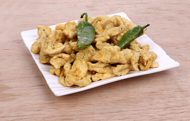 Indian Traditional Spicy food Gathiya, Gathiya Namkeen with green chili. Popular tea time snack in Gujarat