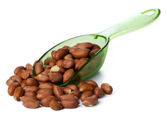 Spoon with peanuts isolated on white background