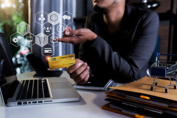 Business hand using laptop with social media marketing icon for internet network technology and business concept.