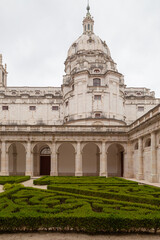Obraz premium Palace of Mafra, Portugal. History landmark in cloud day
